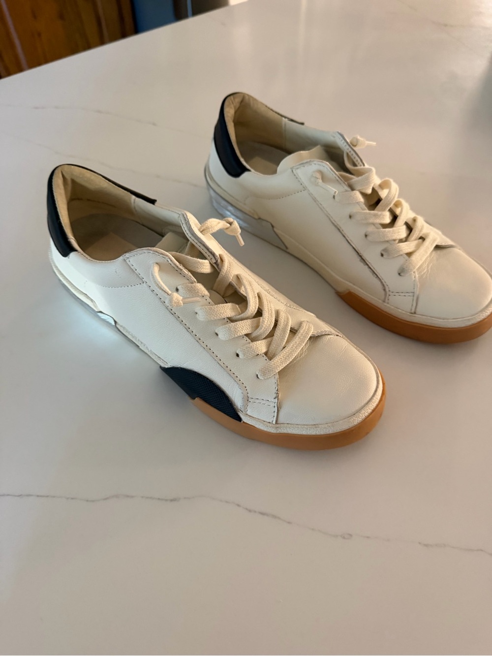 Women’s Cream Leather Lace-Up Sneakers with Navy and Gum Sole.  Dolce Vita